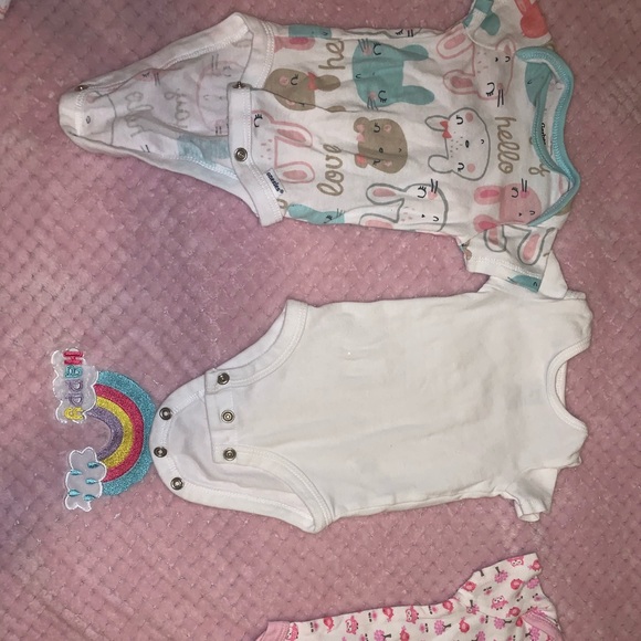 Baby sleepers and onsies. Sizes range from newborn - Picture 3 of 7